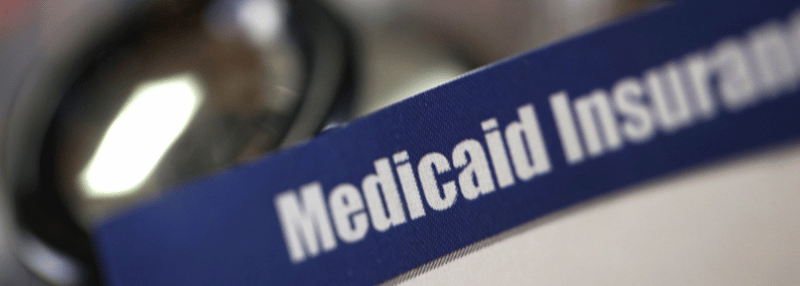 Medicaid insurance card with blurred background